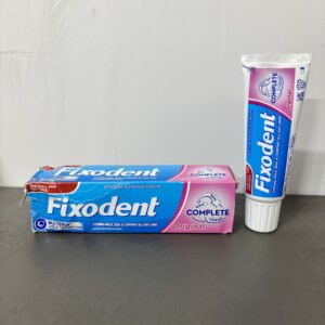 چسب دندان مصنوعی فیکسودنت صورتی - کارتن اسیب دیده اما سالم انقضا ۲۰۲۷/۰۲